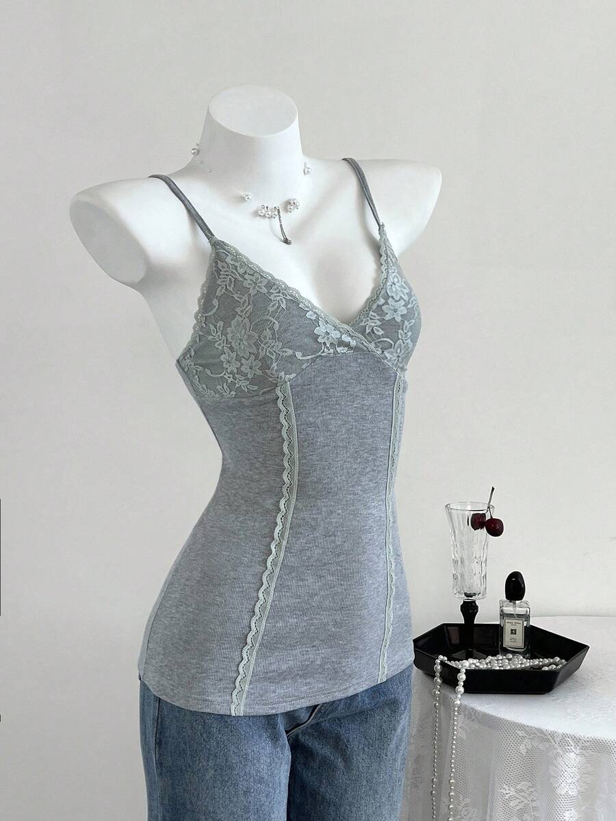 Women's slim fit backless cami tank top with contrast lace patchwork details, spaghetti straps, and high-stretch knitted ribbed fabric.