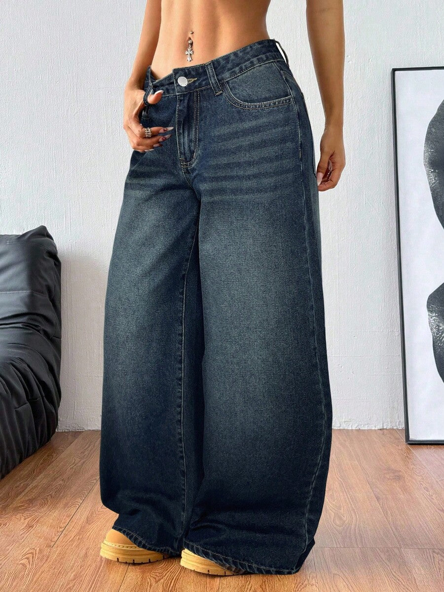 Women's loose wide-leg jeans in light wash denim with low waist and extra-long relaxed fit