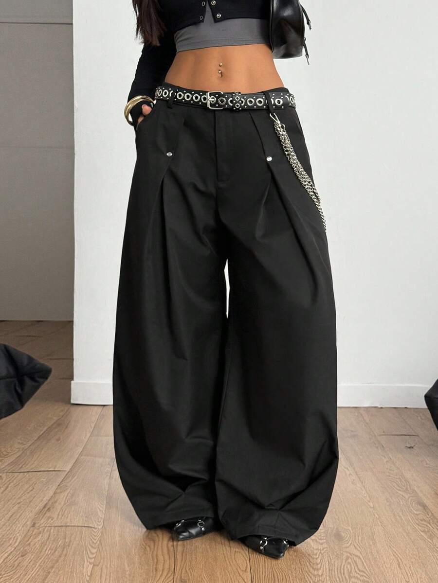 Women's black high-waist wide-leg pants in loose fit woven fabric with button and zipper closure