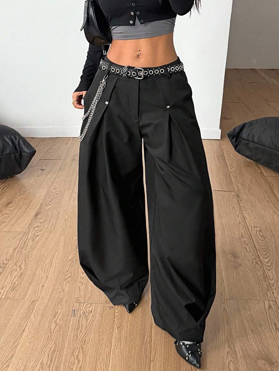 Women's black high-waist wide-leg pants in loose fit woven fabric with button and zipper closure