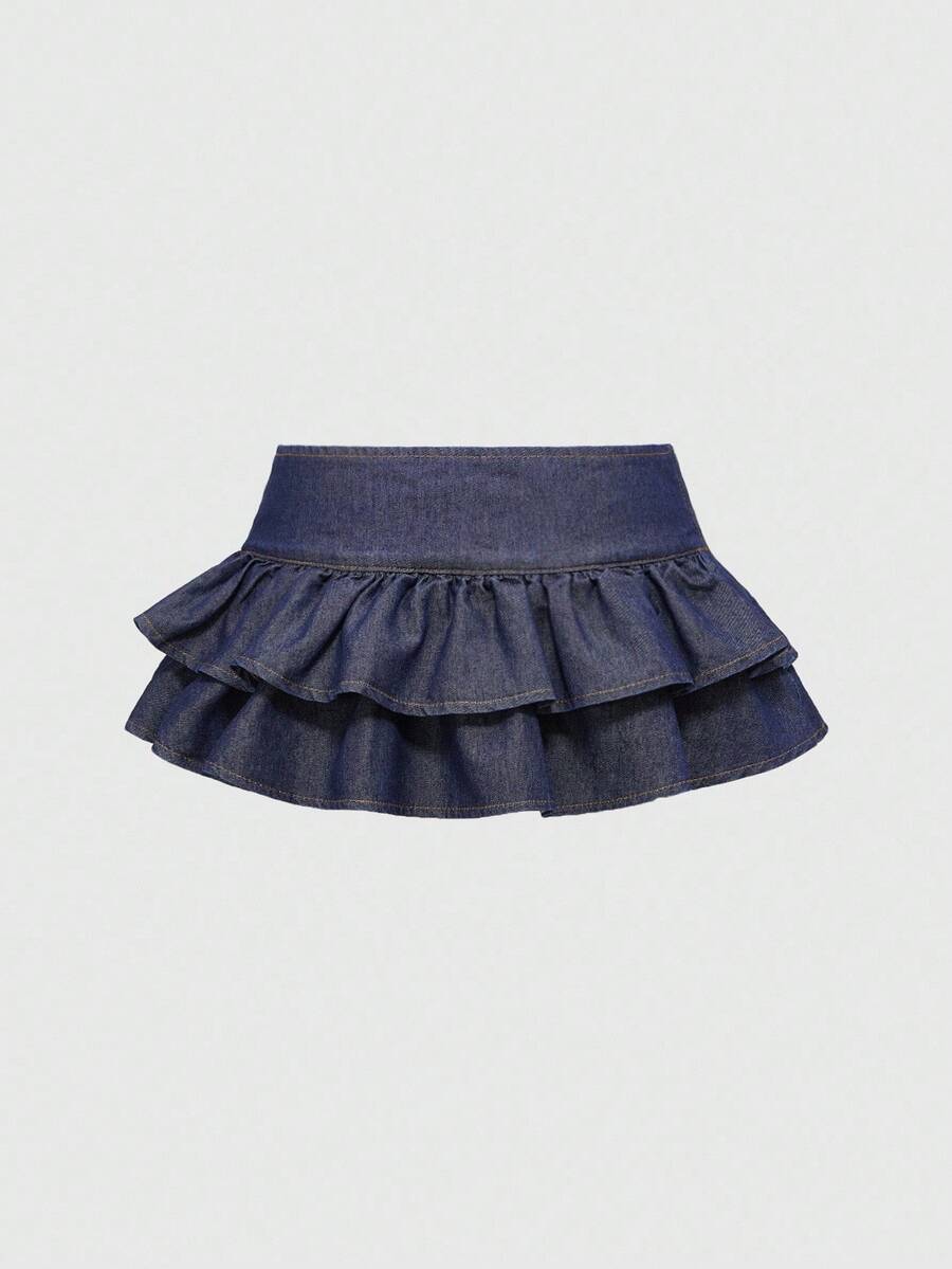 Y2K ultra low waist mini skirt with tiered layer detail, ruffle hem, zipper closure, straight silhouette, and fabric.