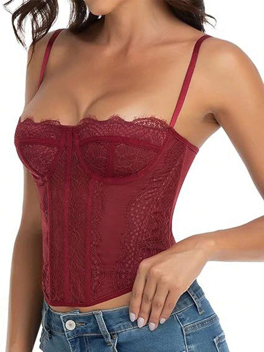 Women's lace bustier corset cami top with spaghetti straps, arm sleeves, asymmetrical contrast lace detail, and buckle accent