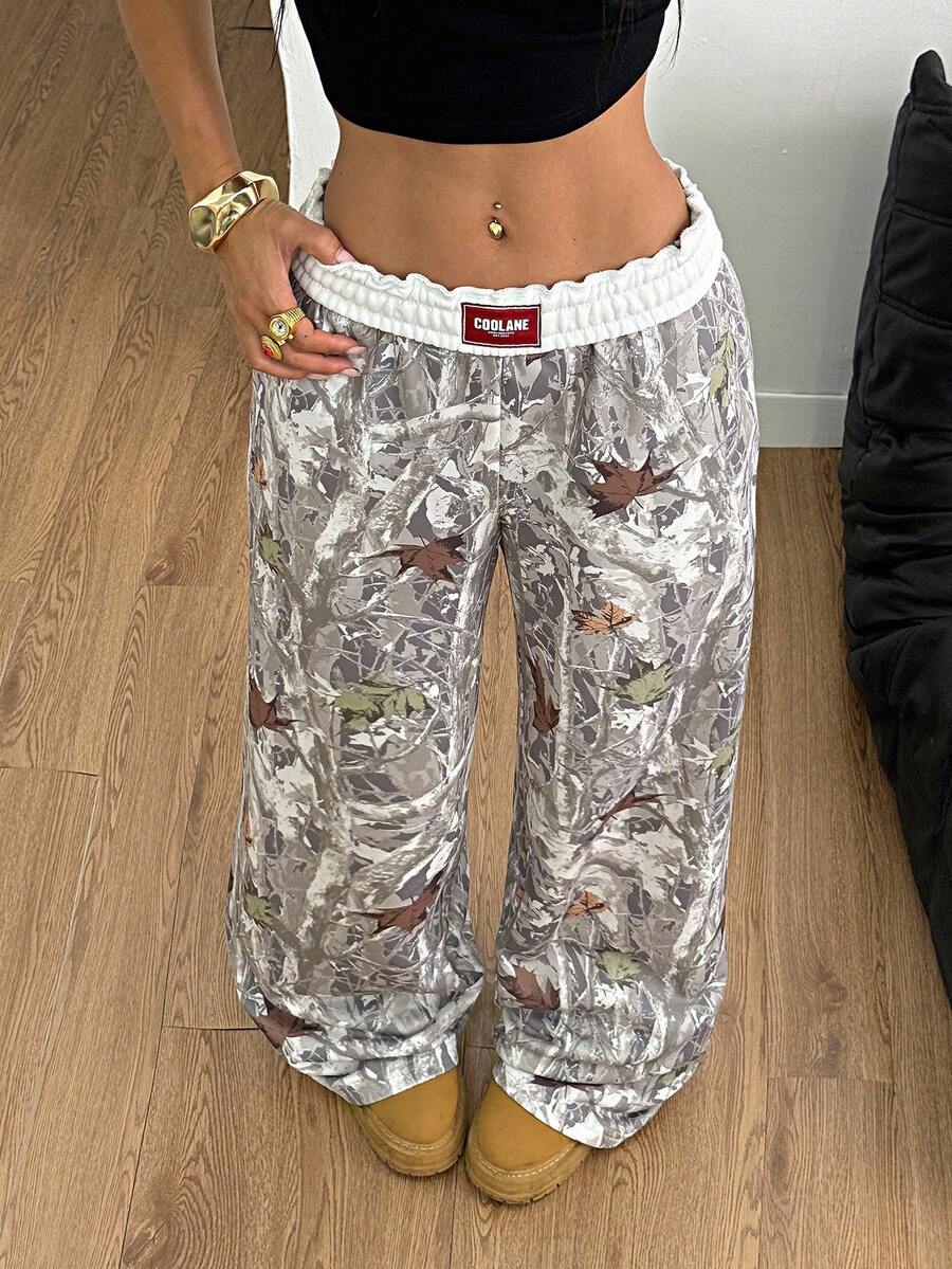 Women's striped straight leg casual trousers with elastic mid waist and side pockets