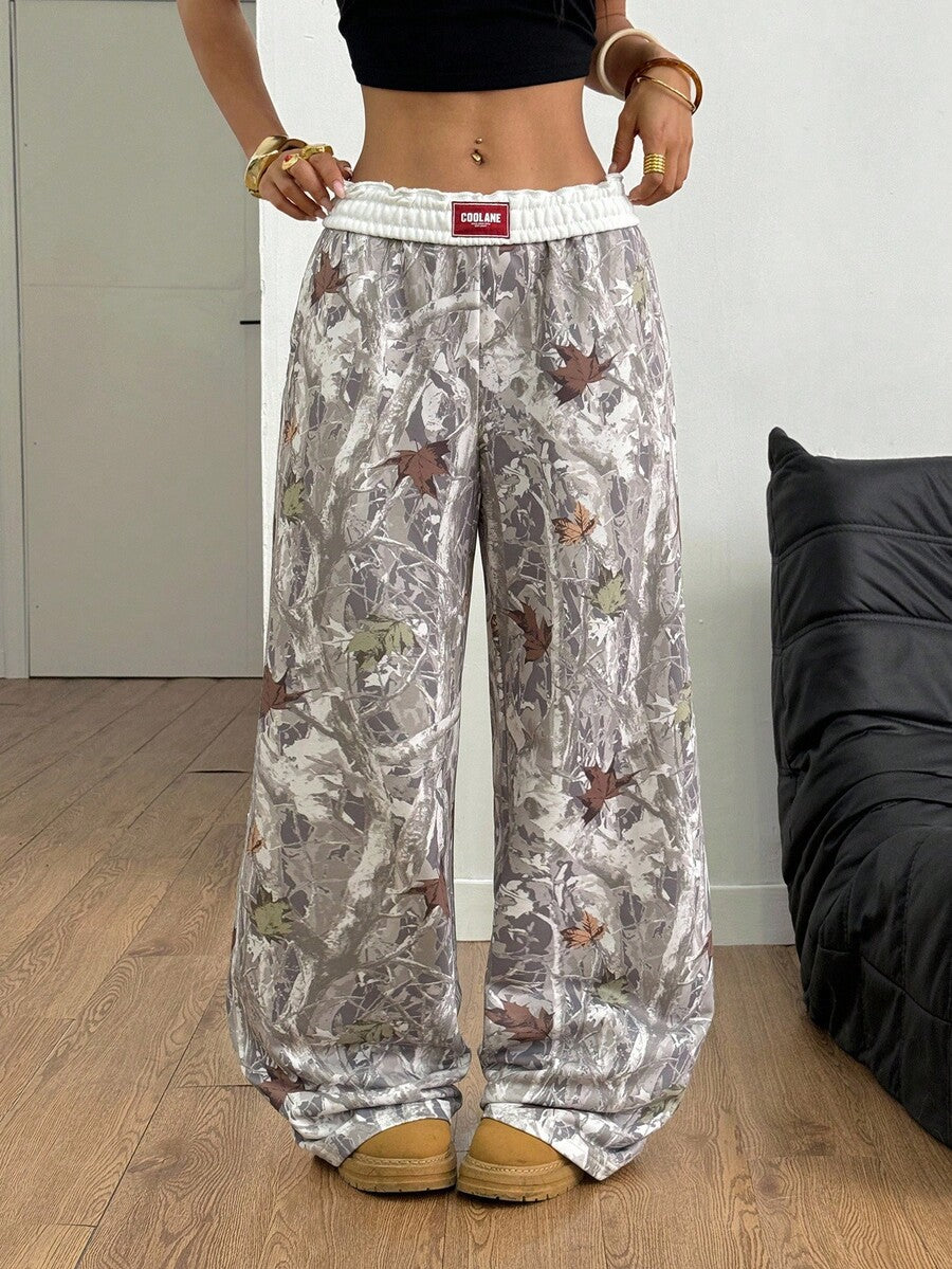 Women's striped straight leg casual trousers with elastic mid waist and side pockets