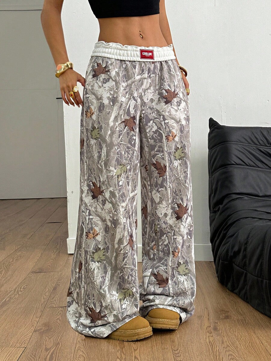Women's striped straight leg casual trousers with elastic mid waist and side pockets
