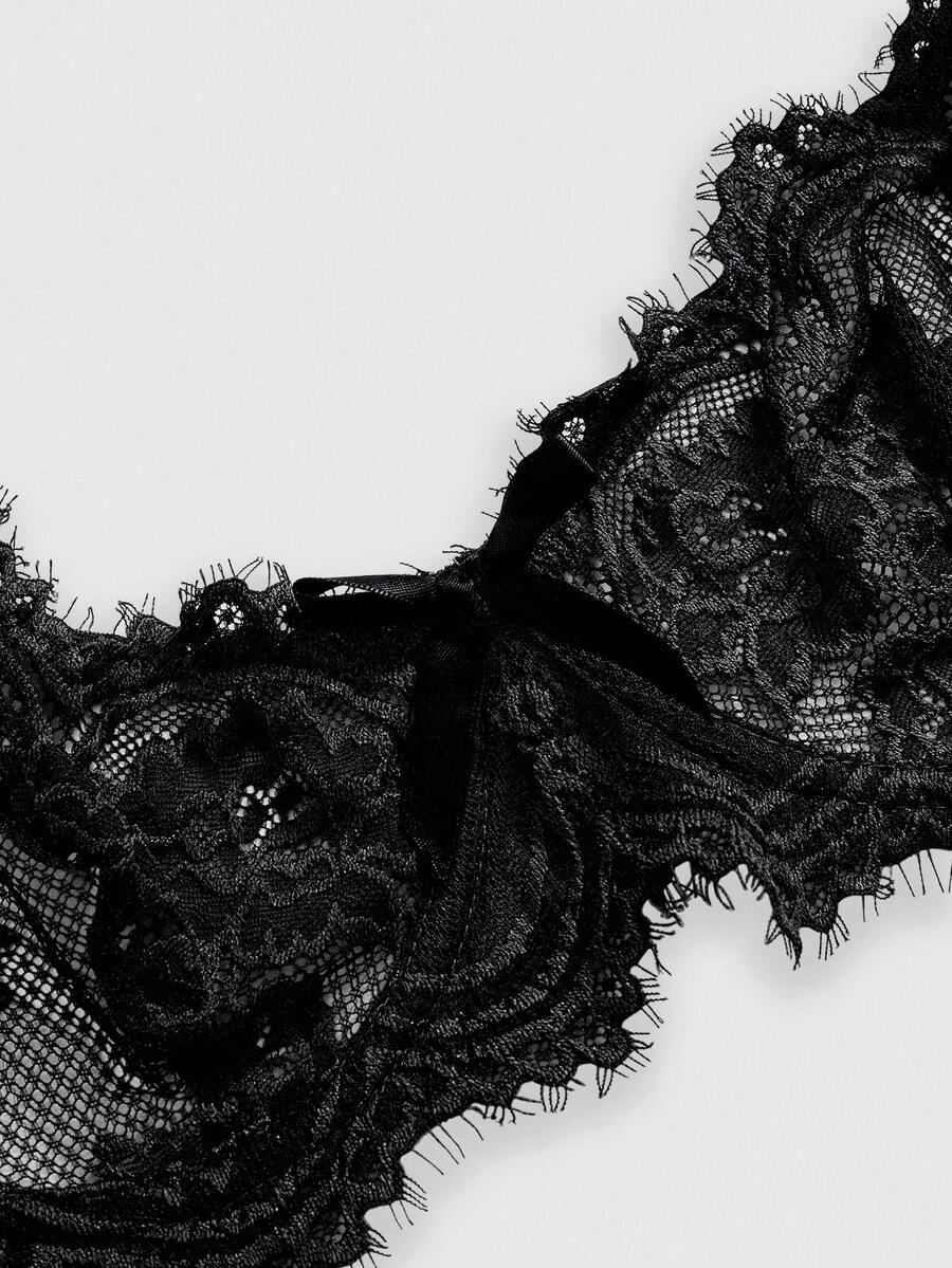 Sheer floral lace underwire triangle bra for women featuring adjustable straps and plunge cup design.