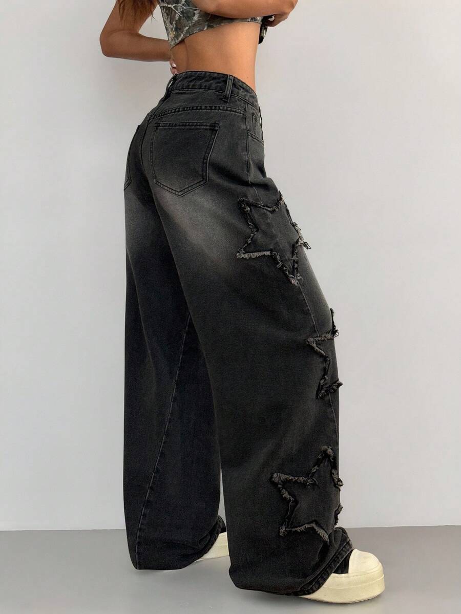Front view of women's loose wide leg denim jeans featuring a mid waist, classic front pockets, and a zipper fly closure.