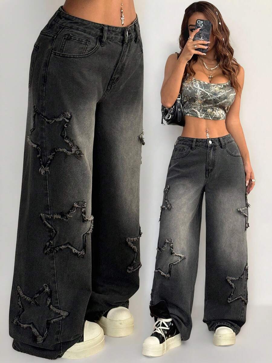 Front view of women's loose wide leg denim jeans featuring a mid waist, classic front pockets, and a zipper fly closure.