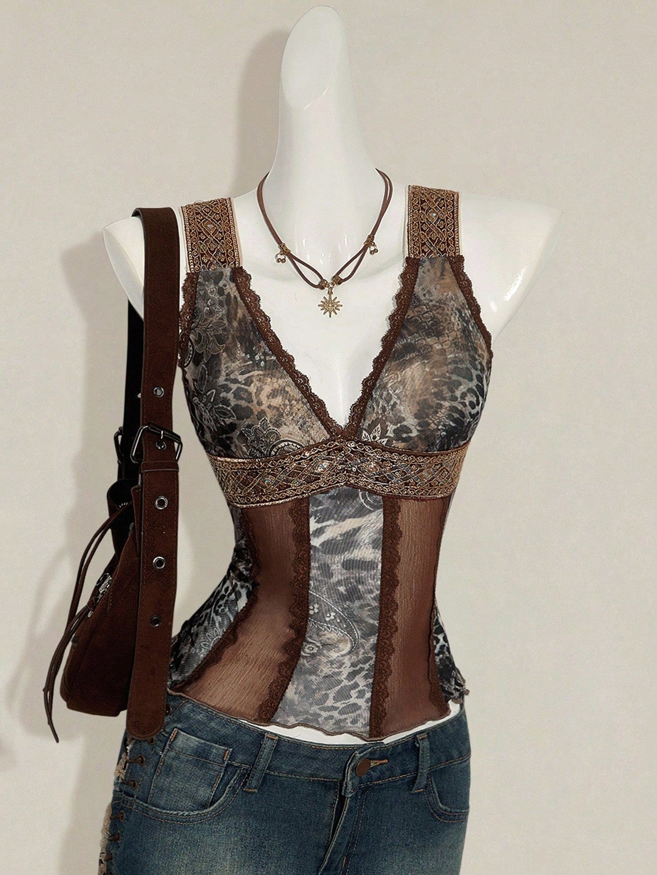 Women's Y2K fitted camisole with V-neckline, contrast lace patchwork, slim fit silhouette, backless design, and asymmetrical hem