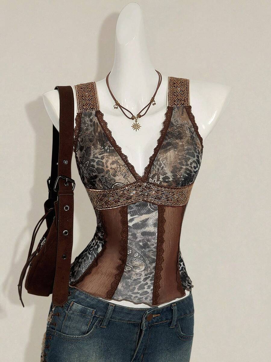 Women's Y2K fitted camisole with V-neckline, contrast lace patchwork, slim fit silhouette, backless design, and asymmetrical hem