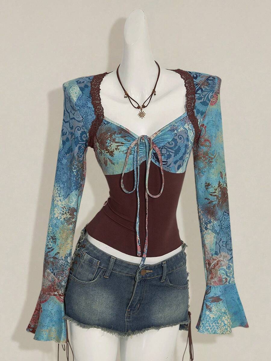 Women's vintage plant print top featuring a sweetheart neckline, flare long sleeves, contrast lace, knot detail, and ruched asymmetrical hem in multicolor.