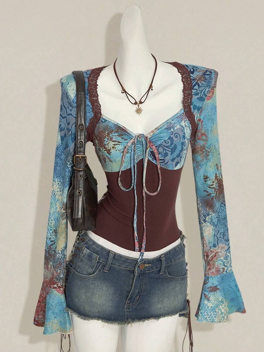 Women's vintage plant print top featuring a sweetheart neckline, flare long sleeves, contrast lace, knot detail, and ruched asymmetrical hem in multicolor.