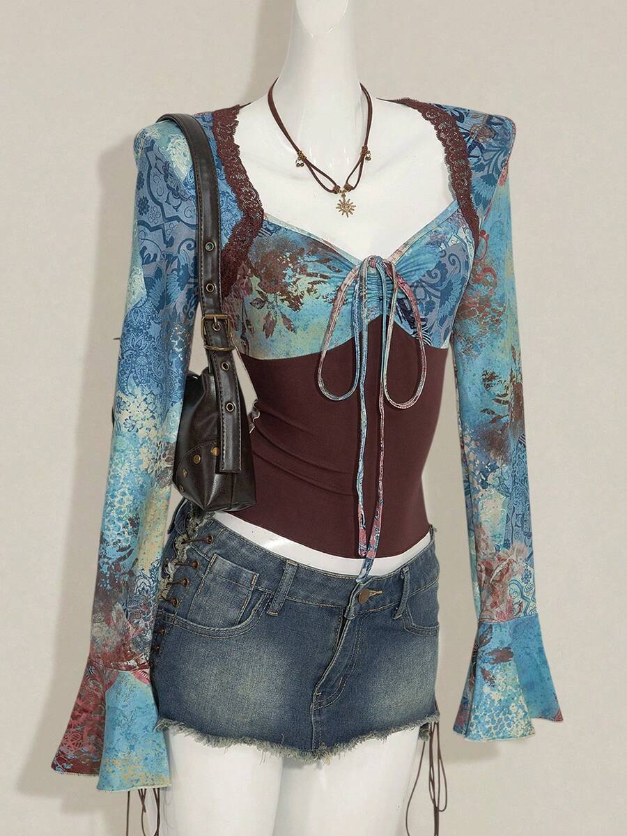 Women's vintage plant print top featuring a sweetheart neckline, flare long sleeves, contrast lace, knot detail, and ruched asymmetrical hem in multicolor.
