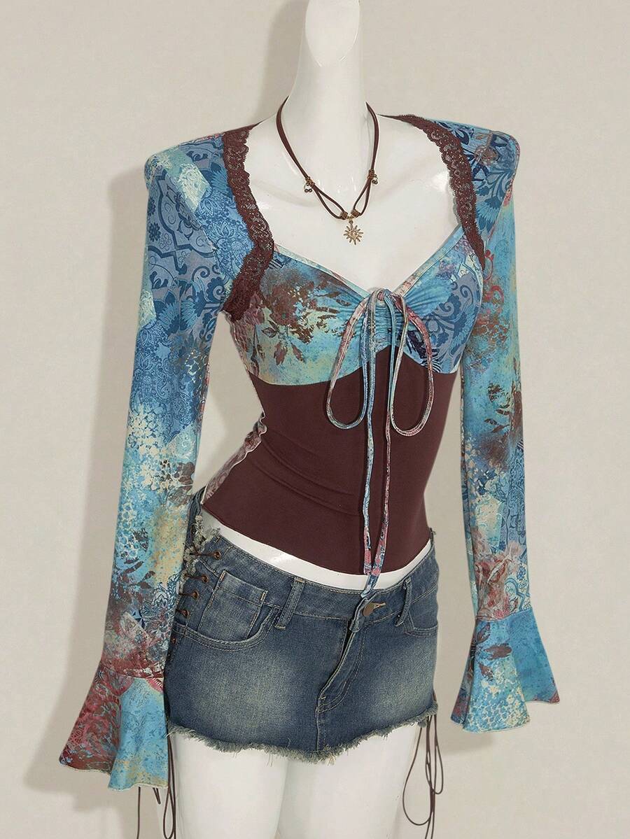Women's vintage plant print top featuring a sweetheart neckline, flare long sleeves, contrast lace, knot detail, and ruched asymmetrical hem in multicolor.