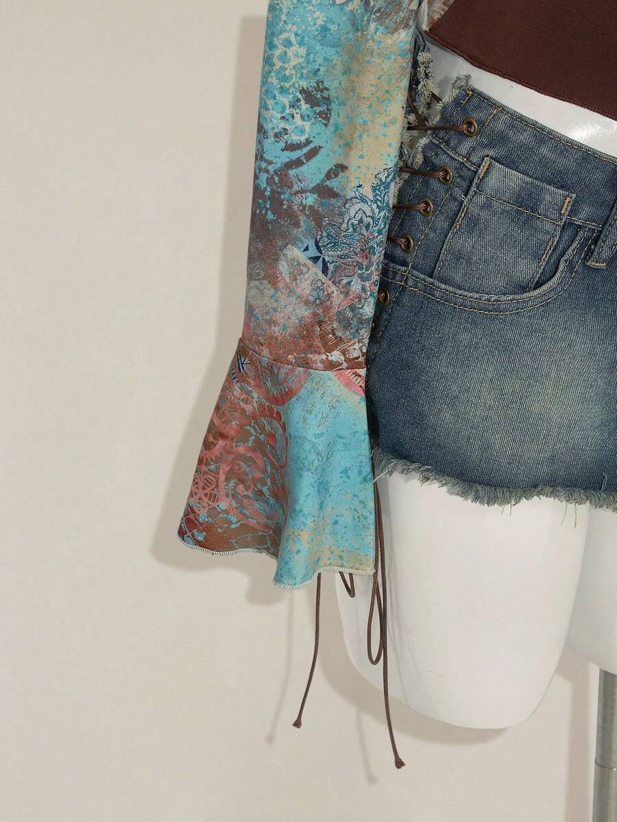 Women's vintage plant print top featuring a sweetheart neckline, flare long sleeves, contrast lace, knot detail, and ruched asymmetrical hem in multicolor.