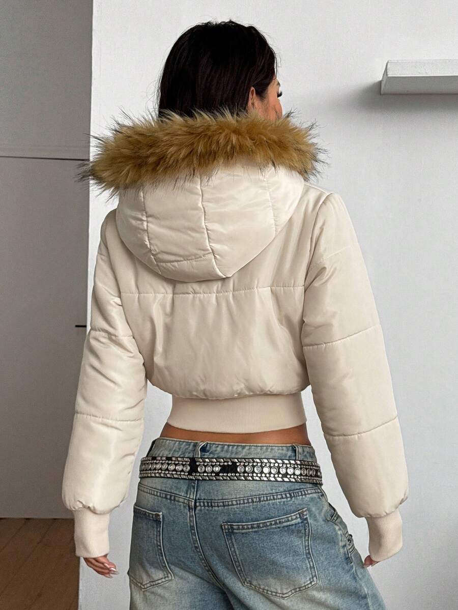 Apricot women's short quilted puffer jacket with hooded neckline, front zipper closure, and rib-knit cuffs.