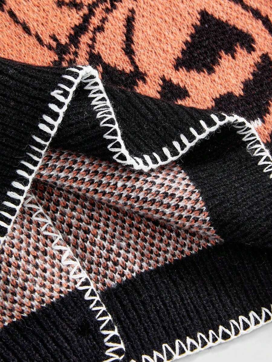 Multicolor women's oversized Halloween knit sweater featuring pumpkin and skull jacquard patterns with a round neck and drop-shoulder sleeves.