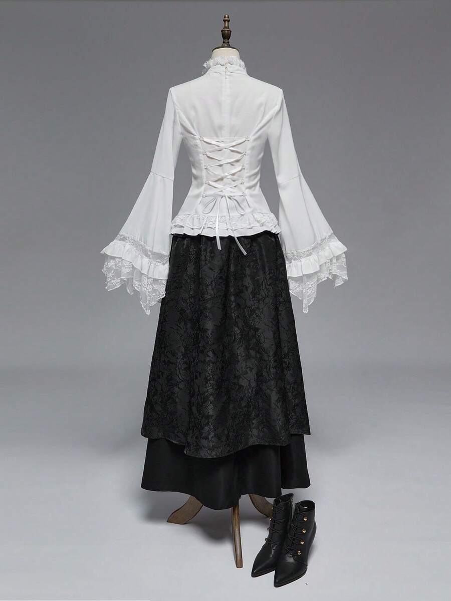 Women's gothic lace blouse with flare long sleeves, tie neckline, and semi-sheer embroidery details.