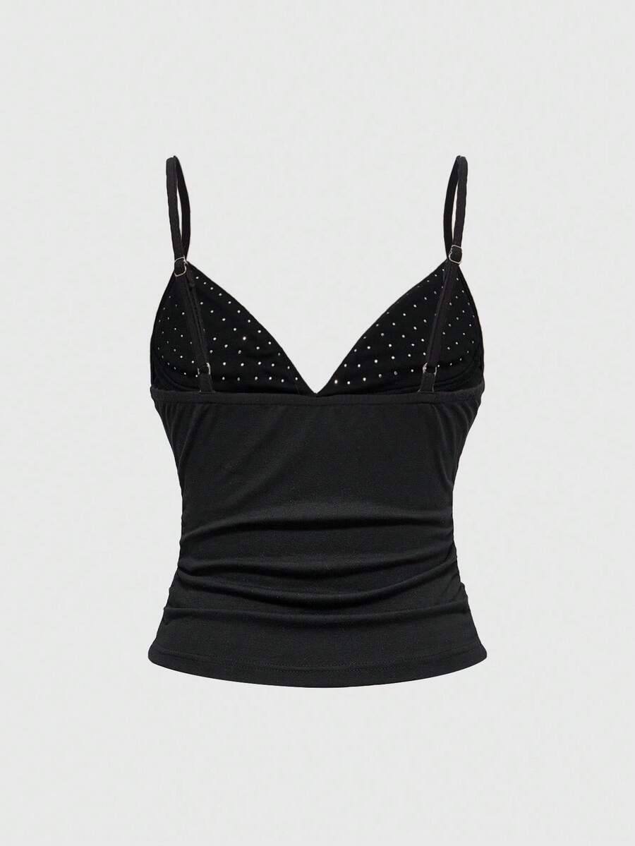 Women's slim fit sleeveless crop top featuring spaghetti straps, ruched detailing, and studded rhinestone accents.