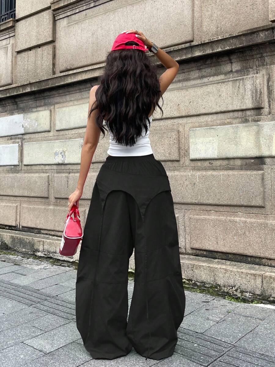 Women's loose fit wide leg parachute pants with elastic drawstring waist and side pockets