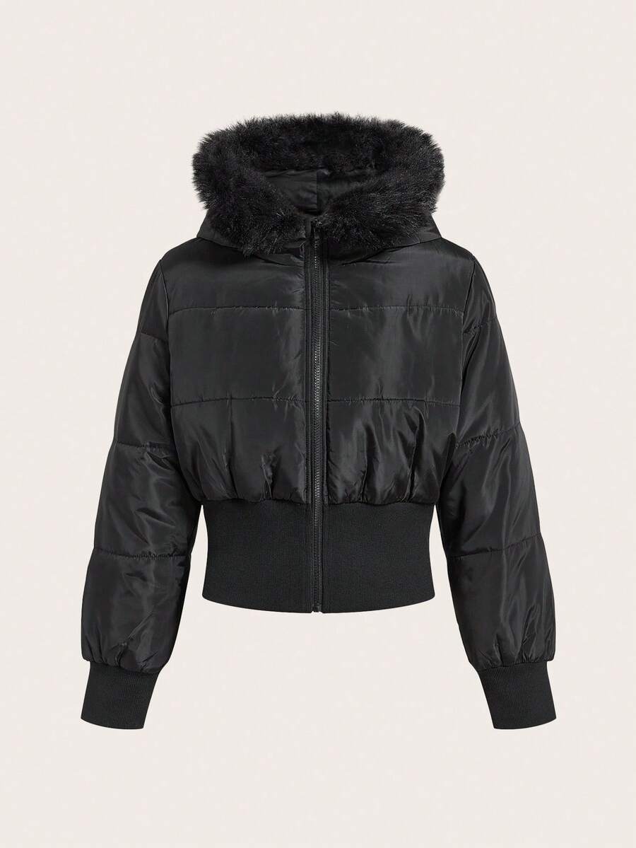 Women's brown cropped puffer jacket featuring a faux fur trimmed hood, front zipper, and ribbed hem.