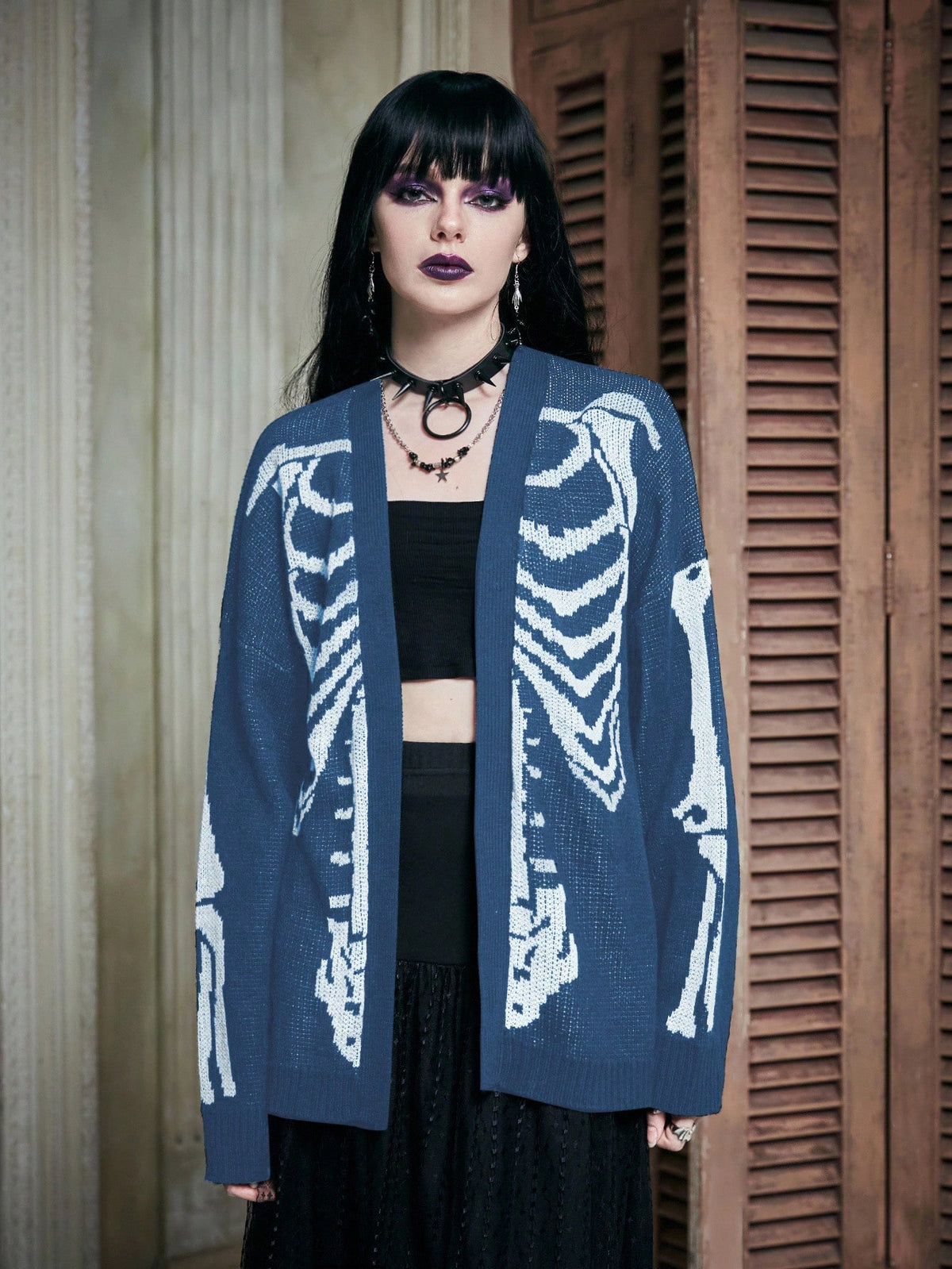 Women's oversized skeleton pattern cardigan with long drop shoulder sleeves and rib-knit trim