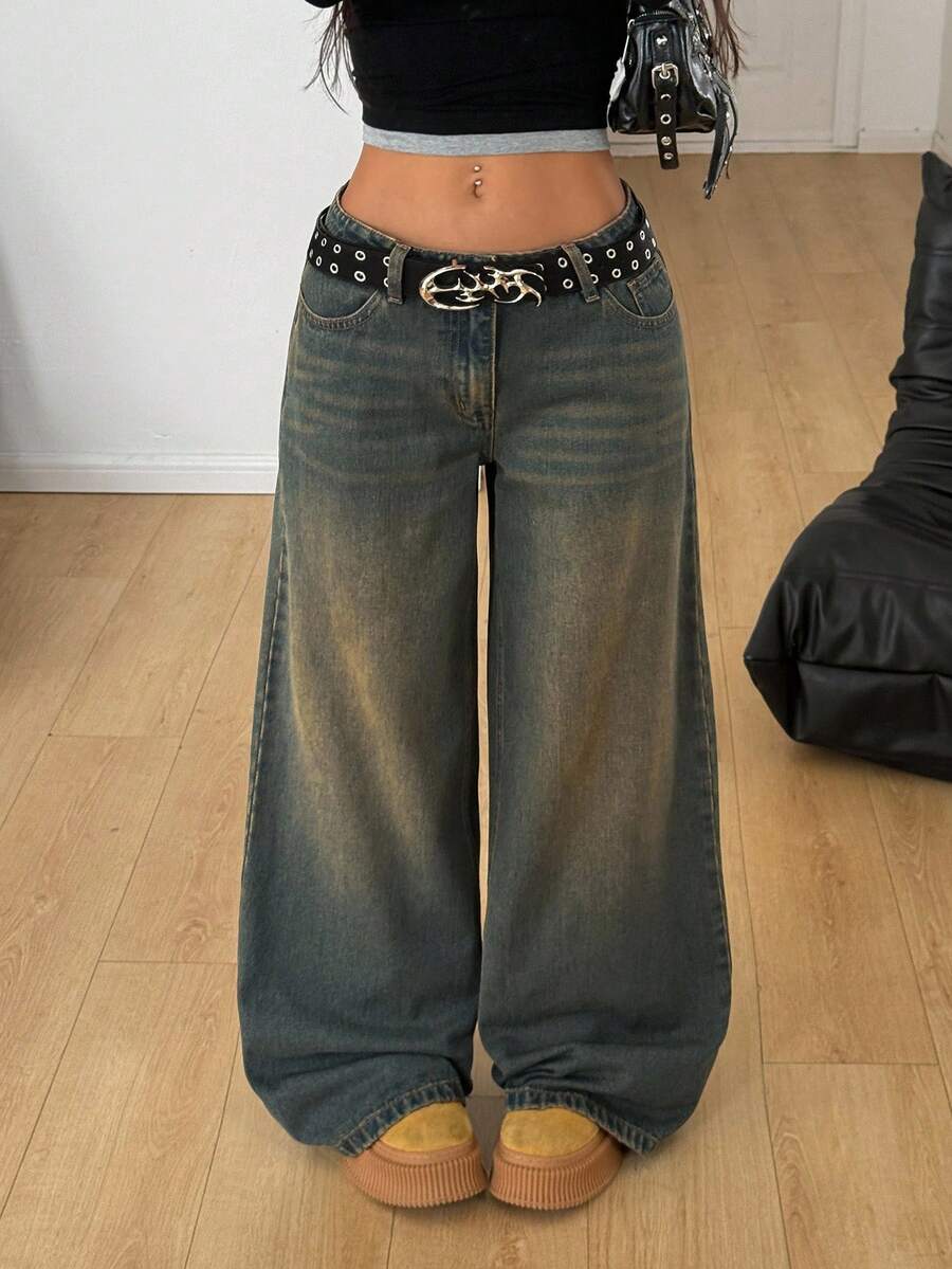 Women's loose wide-leg jeans in light wash denim with low waist and extra-long relaxed fit