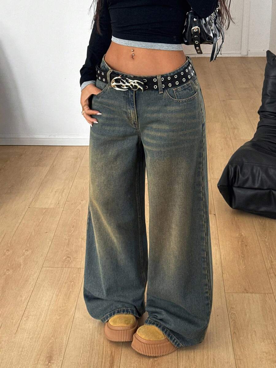 Women's loose wide-leg jeans in light wash denim with low waist and extra-long relaxed fit