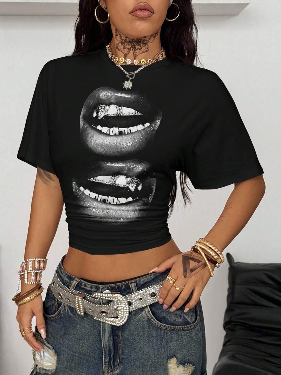 Women's striped short sleeve t-shirt featuring a casual drop shoulder design and round neckline.