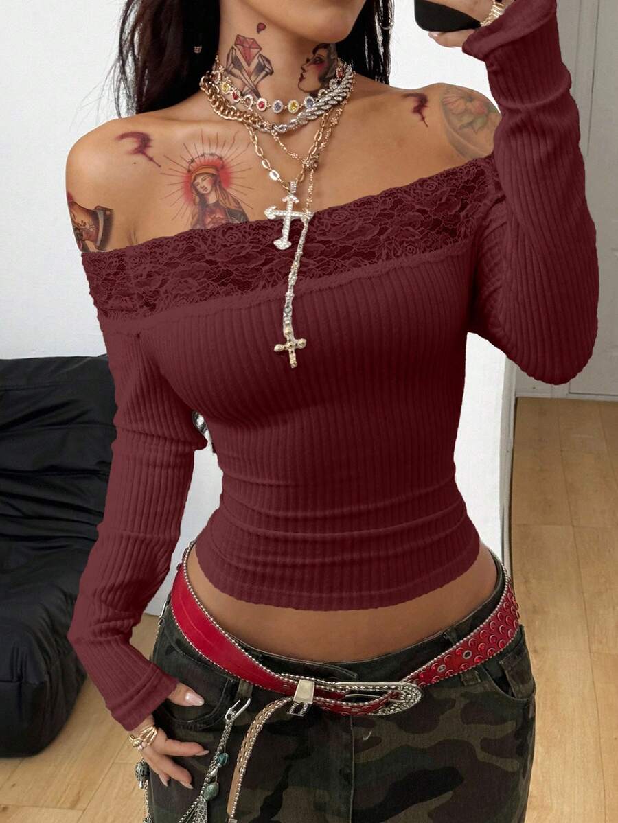 Women's slim fit off the shoulder long sleeve knitted top featuring contrast lace trim and ruched accents.