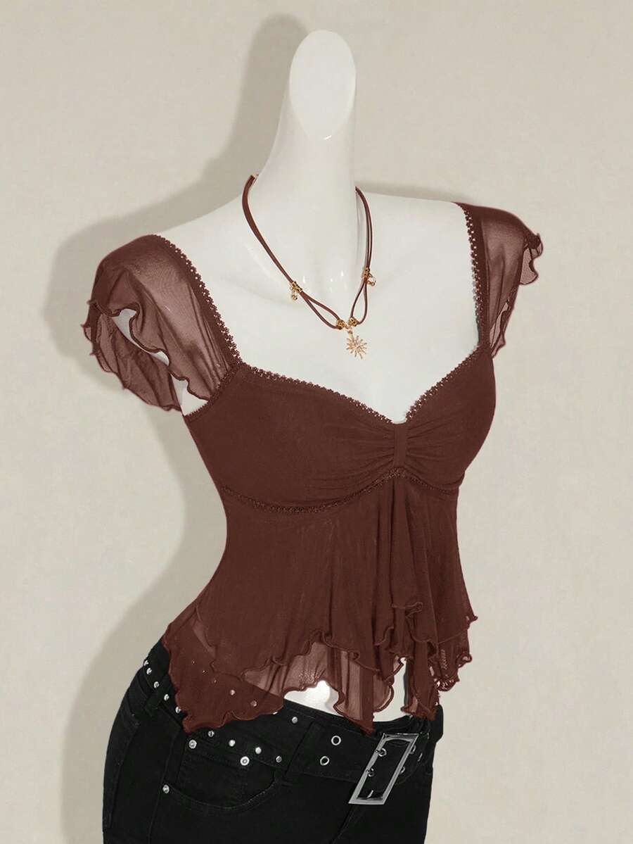 Black slim fit women's ruched front camisole tank top featuring contrast mesh inserts, square neckline, and an asymmetrical crop hem.