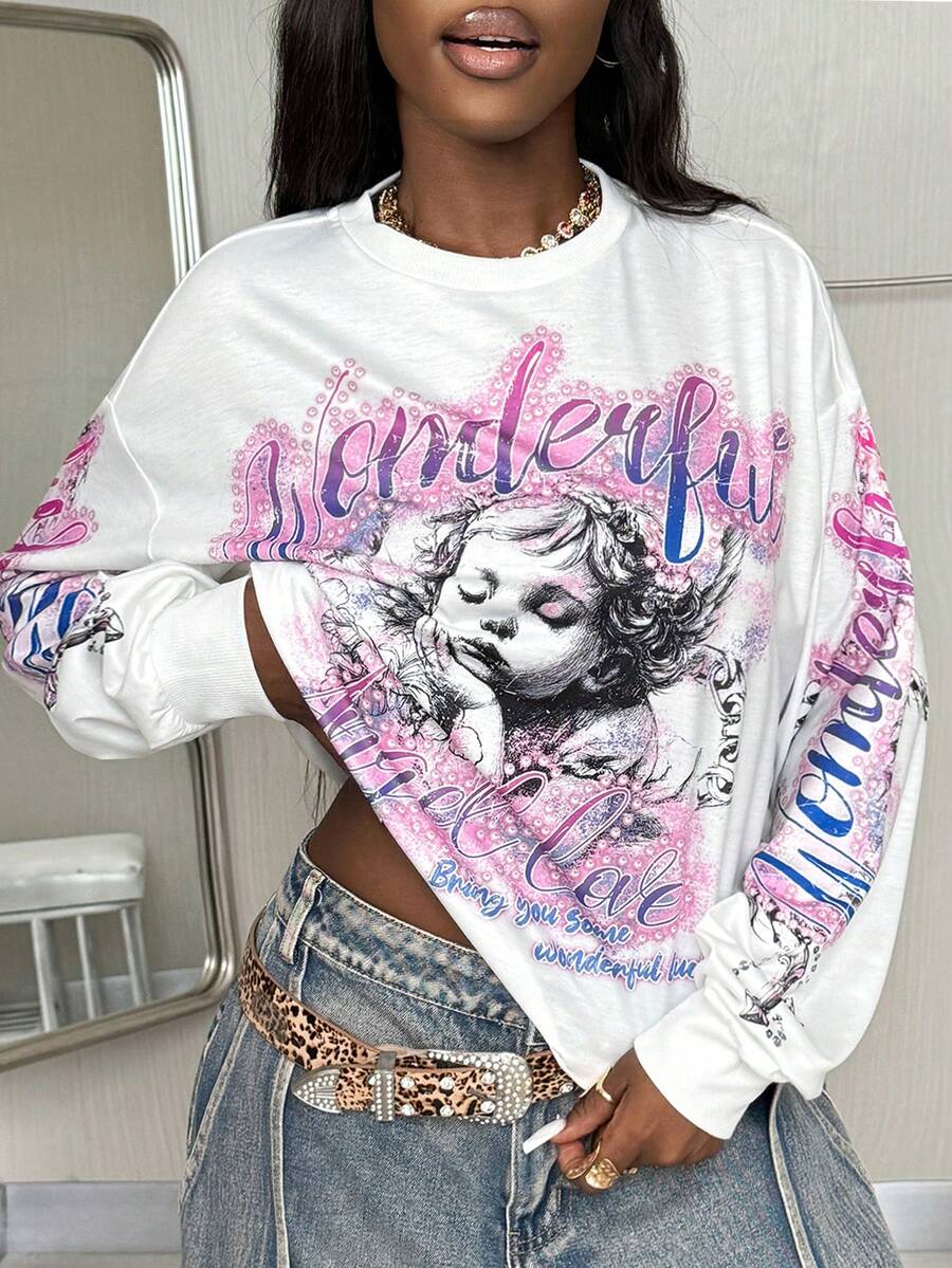 Women's white oversized long sleeve graphic T-shirt with drop shoulders and a round neckline.