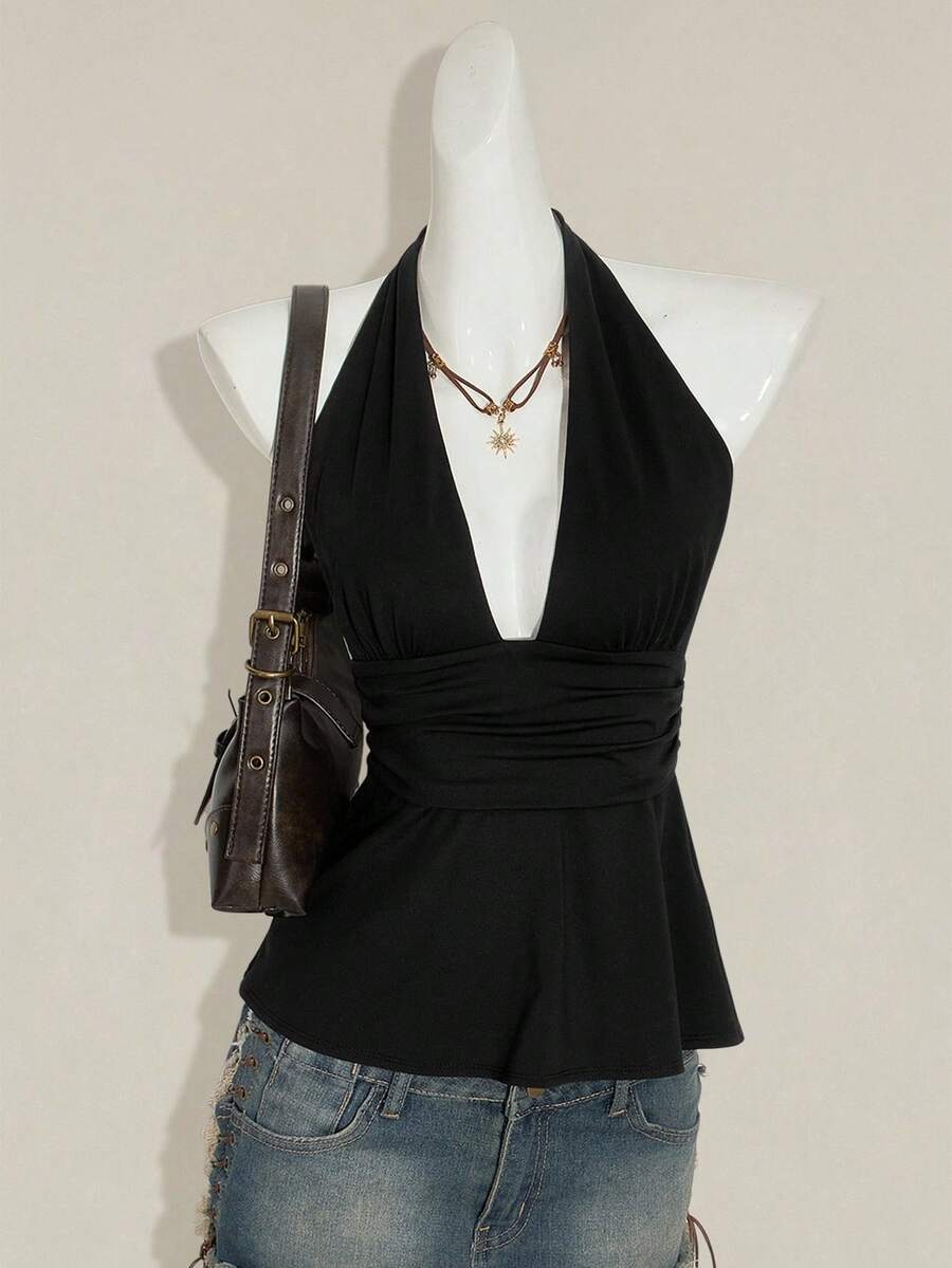 Women's backless halter babydoll tank top featuring a square neckline, slim fit silhouette, and a flared ruffle hem.