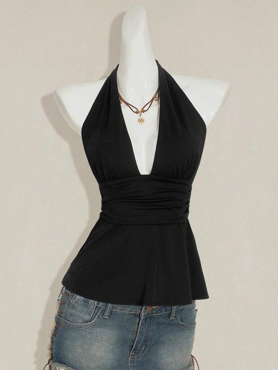 Women's backless halter babydoll tank top featuring a square neckline, slim fit silhouette, and a flared ruffle hem.