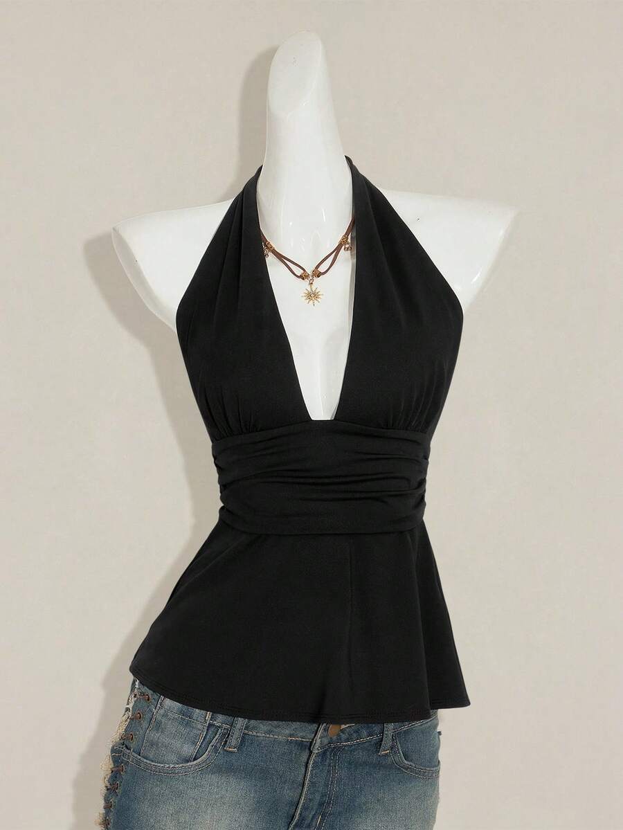 Women's backless halter babydoll tank top featuring a square neckline, slim fit silhouette, and a flared ruffle hem.