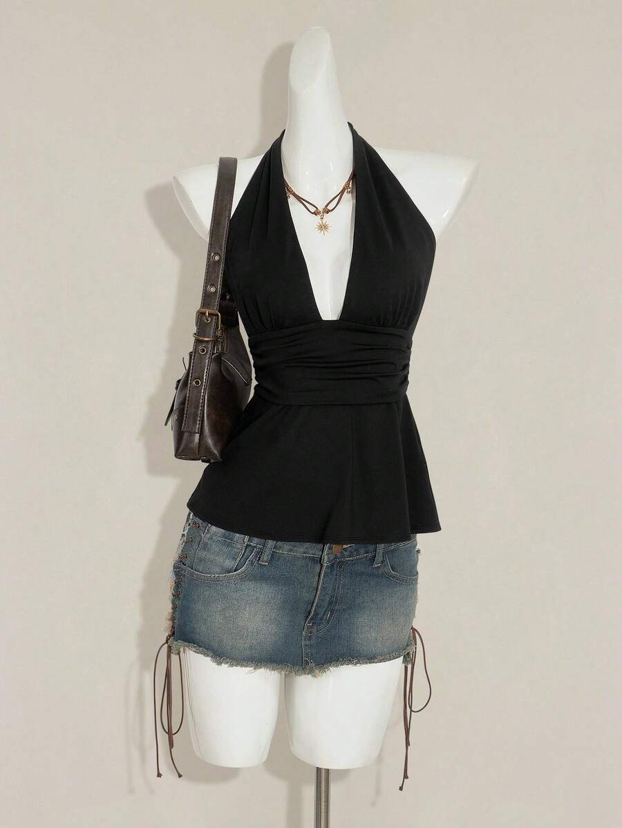 Women's backless halter babydoll tank top featuring a square neckline, slim fit silhouette, and a flared ruffle hem.