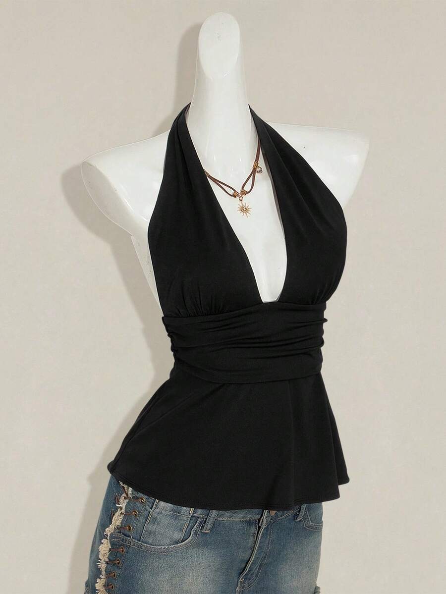 Women's backless halter babydoll tank top featuring a square neckline, slim fit silhouette, and a flared ruffle hem.