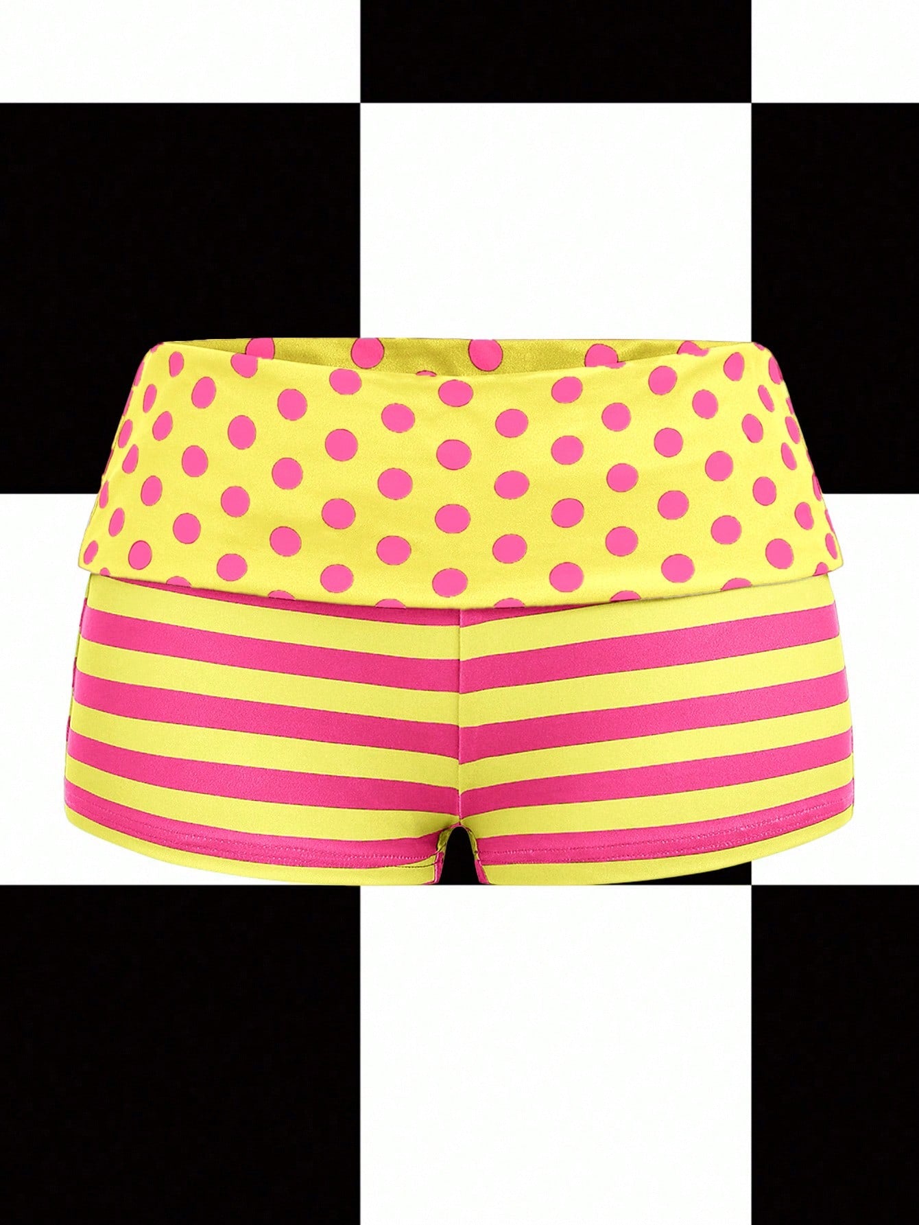 Women's black low waist mini track shorts with contrast polka dot, striped, geometric, and plant-inspired print details, elastic waistband, and skinny fit