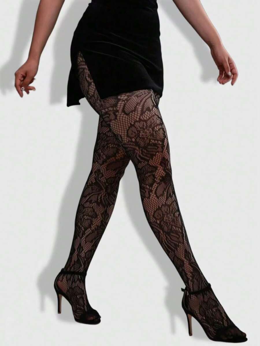 Women's black goth spider web pattern mesh tights with rhinestone details