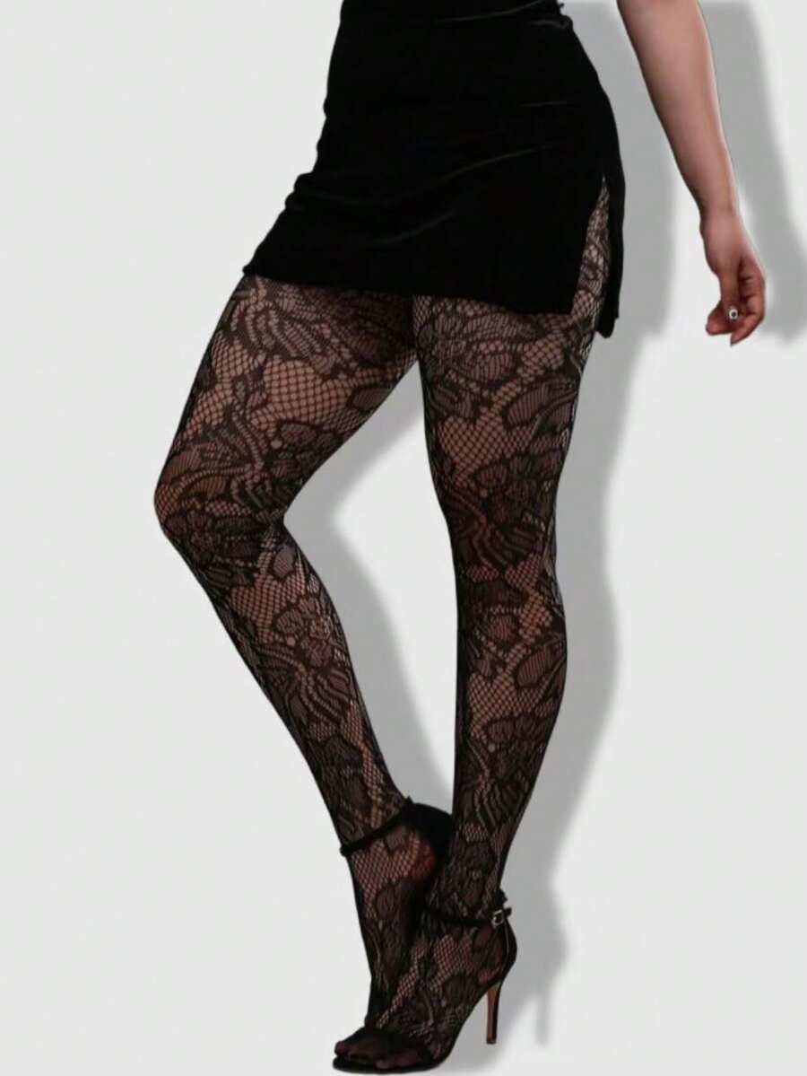 Women's black goth spider web pattern mesh tights with rhinestone details