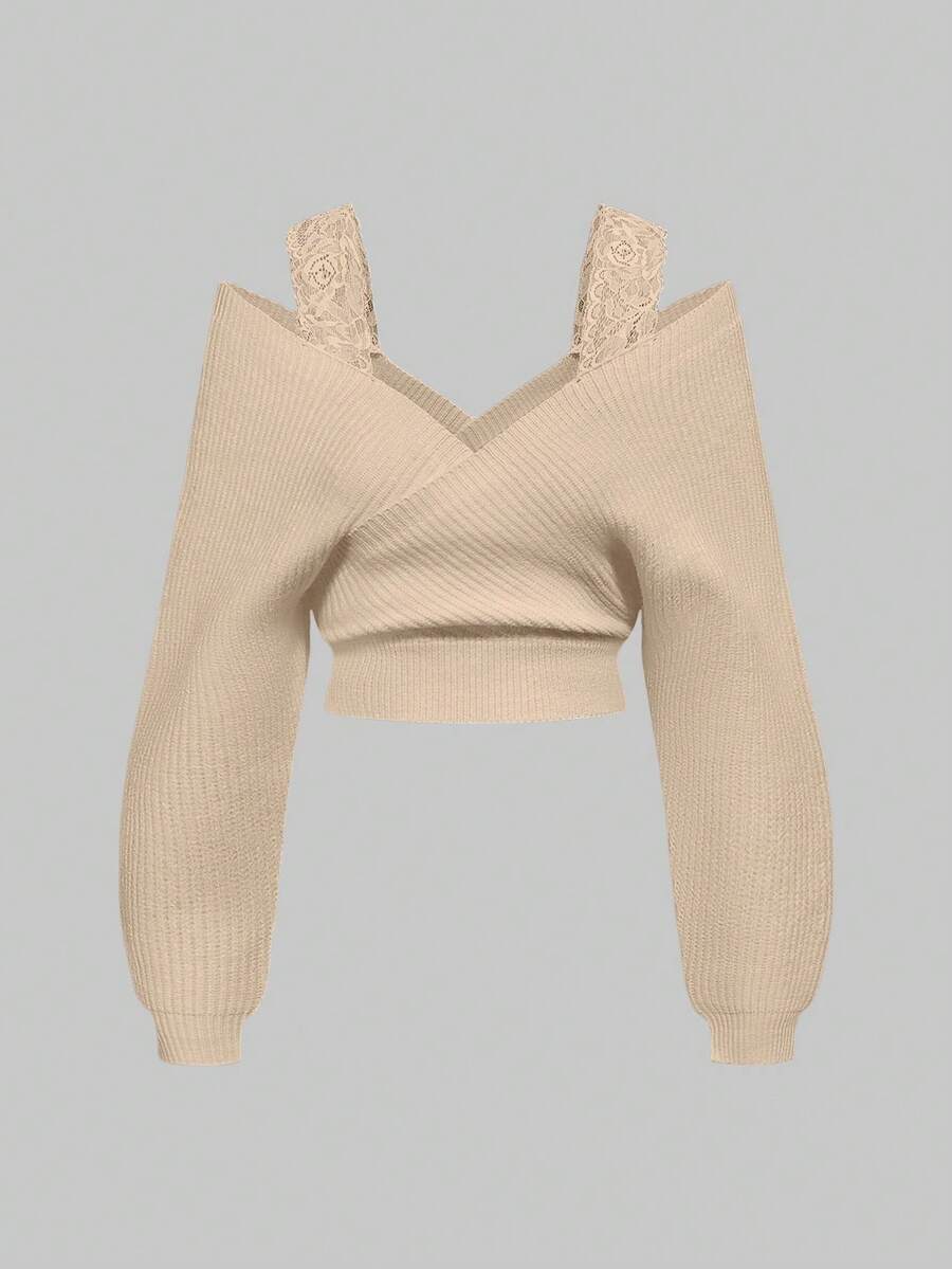 Women's two-piece rib-knit sweater set featuring a long-sleeve cold-shoulder crop top with strap details and matching wide-leg pants.