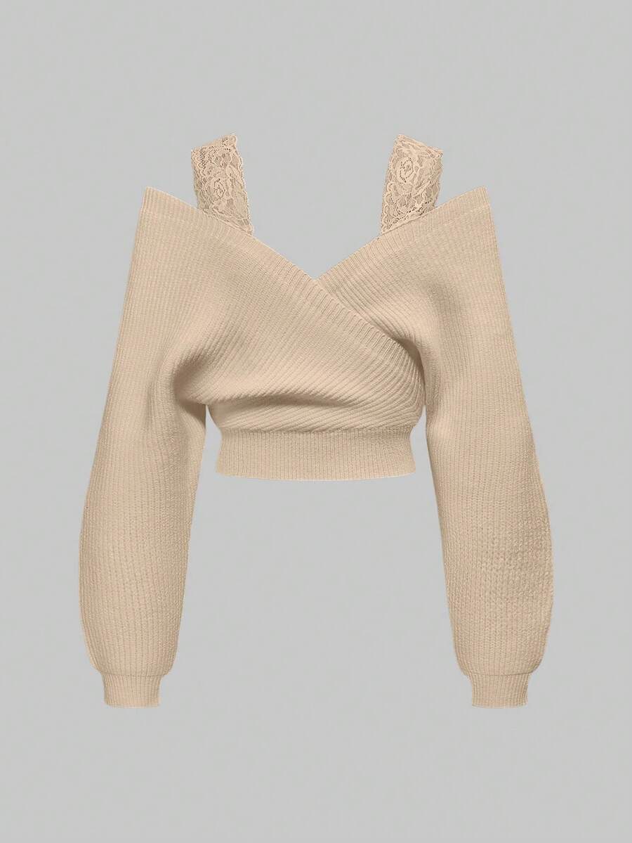 Women's two-piece rib-knit sweater set featuring a long-sleeve cold-shoulder crop top with strap details and matching wide-leg pants.