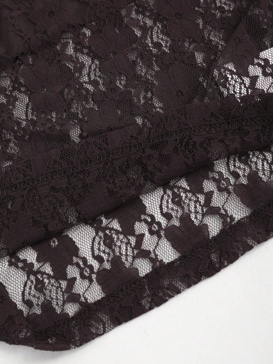 Women's solid lace halter top featuring a backless slim fit design with semi-sheer lace detail.