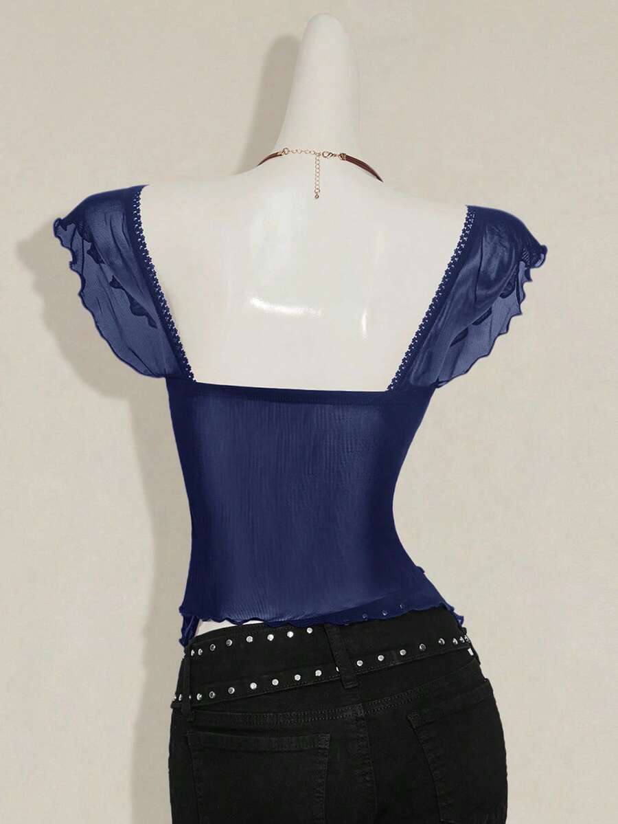 Black slim fit women's ruched front camisole tank top featuring contrast mesh inserts, square neckline, and an asymmetrical crop hem.