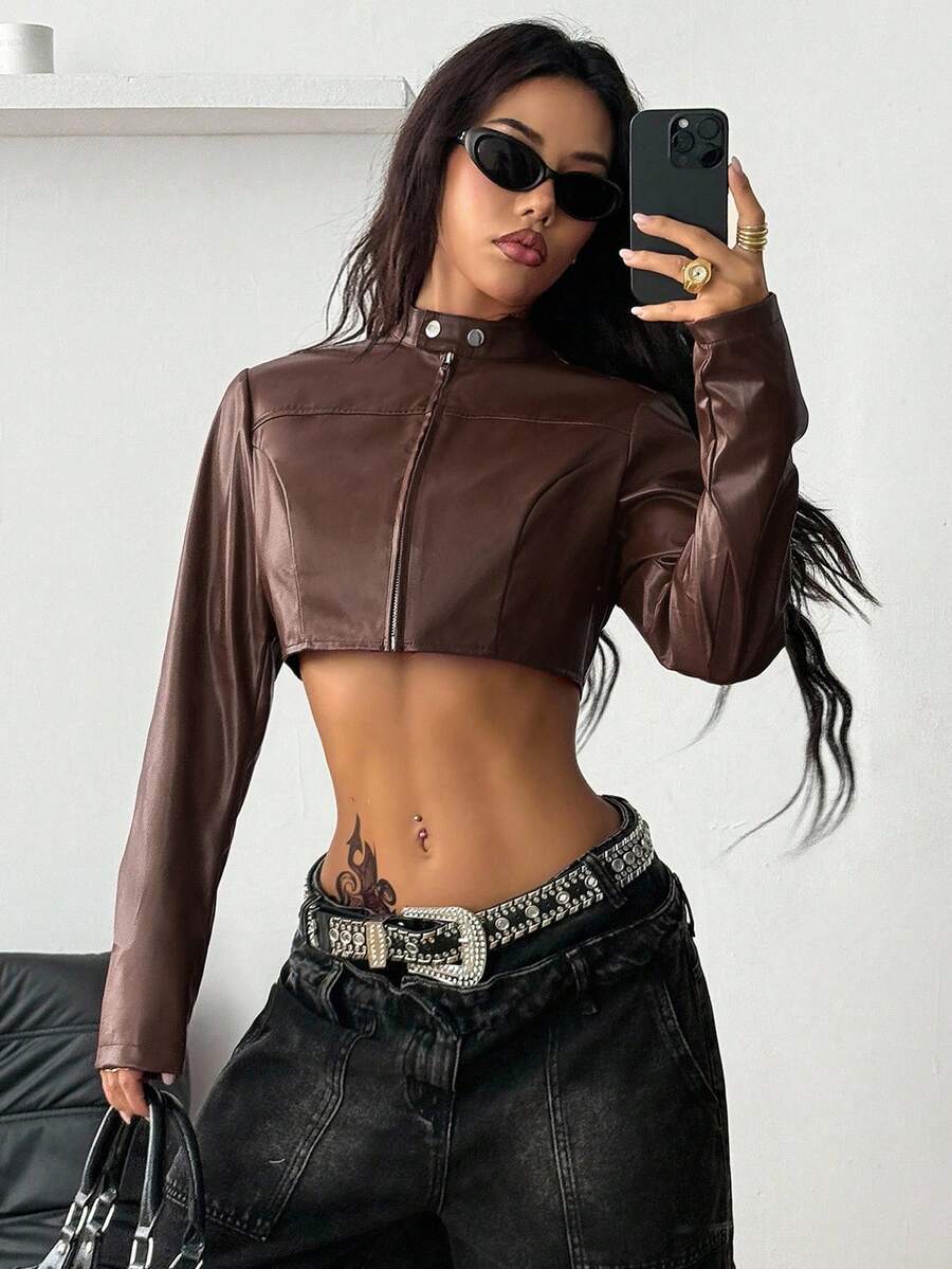 Women's metallic grey cropped faux leather jacket featuring a stand collar and asymmetrical zip front closure.