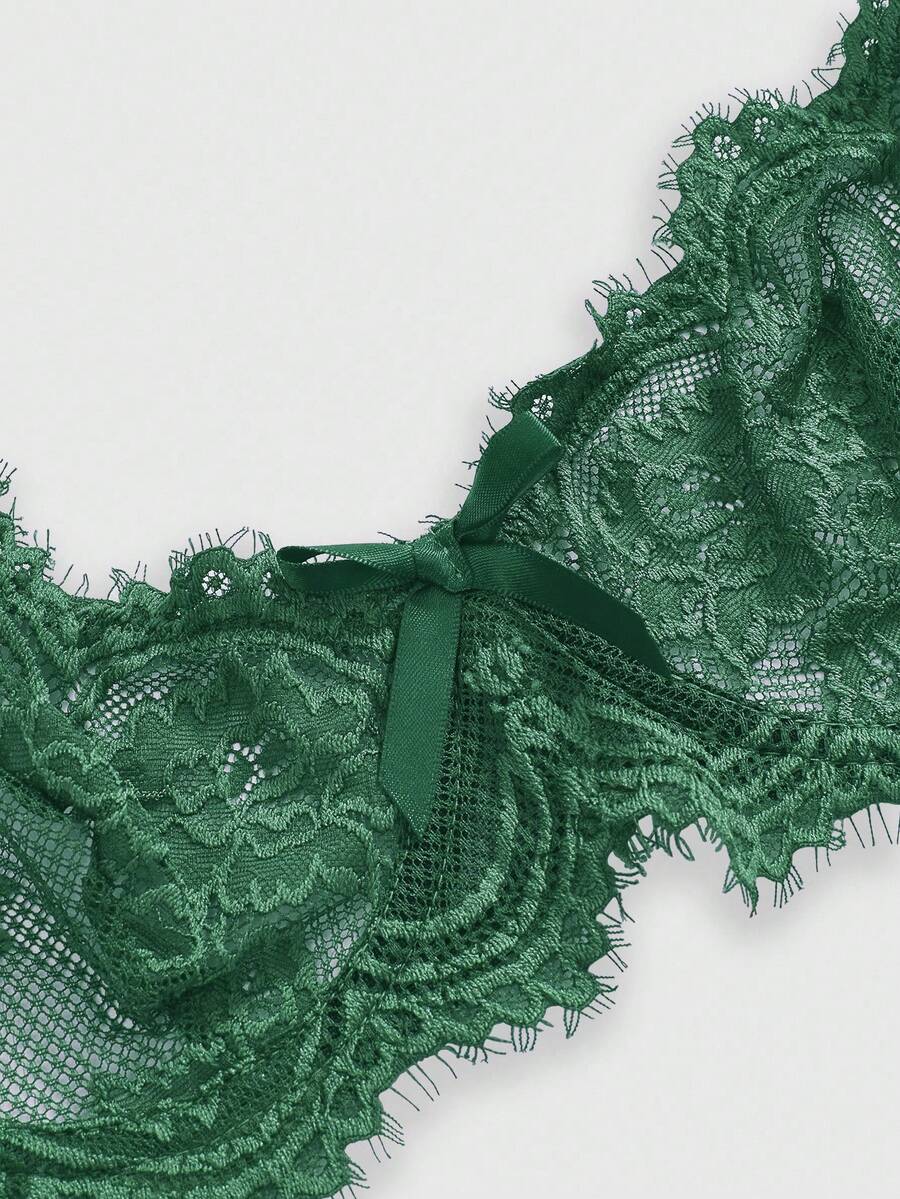 Sheer floral lace underwire triangle bra for women featuring adjustable straps and plunge cup design.