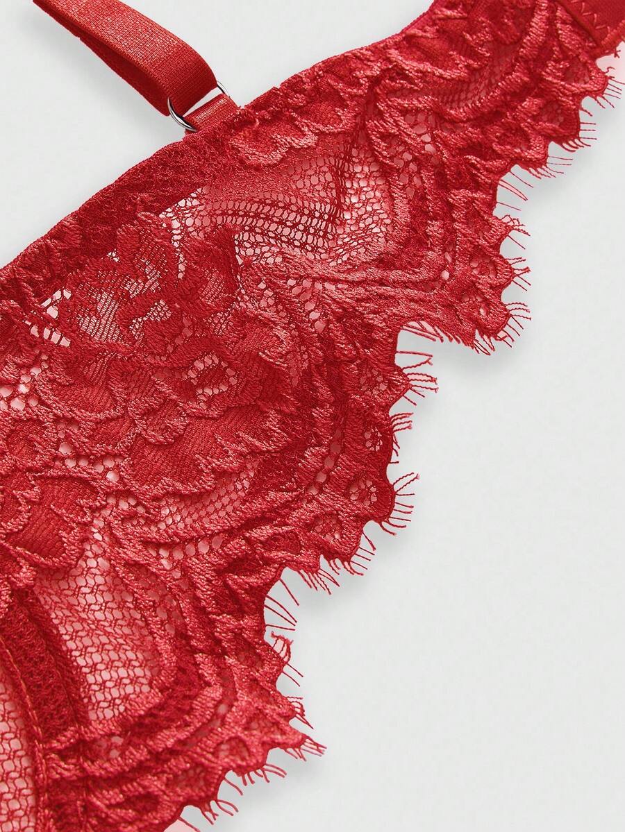Sheer floral lace underwire triangle bra for women featuring adjustable straps and plunge cup design.