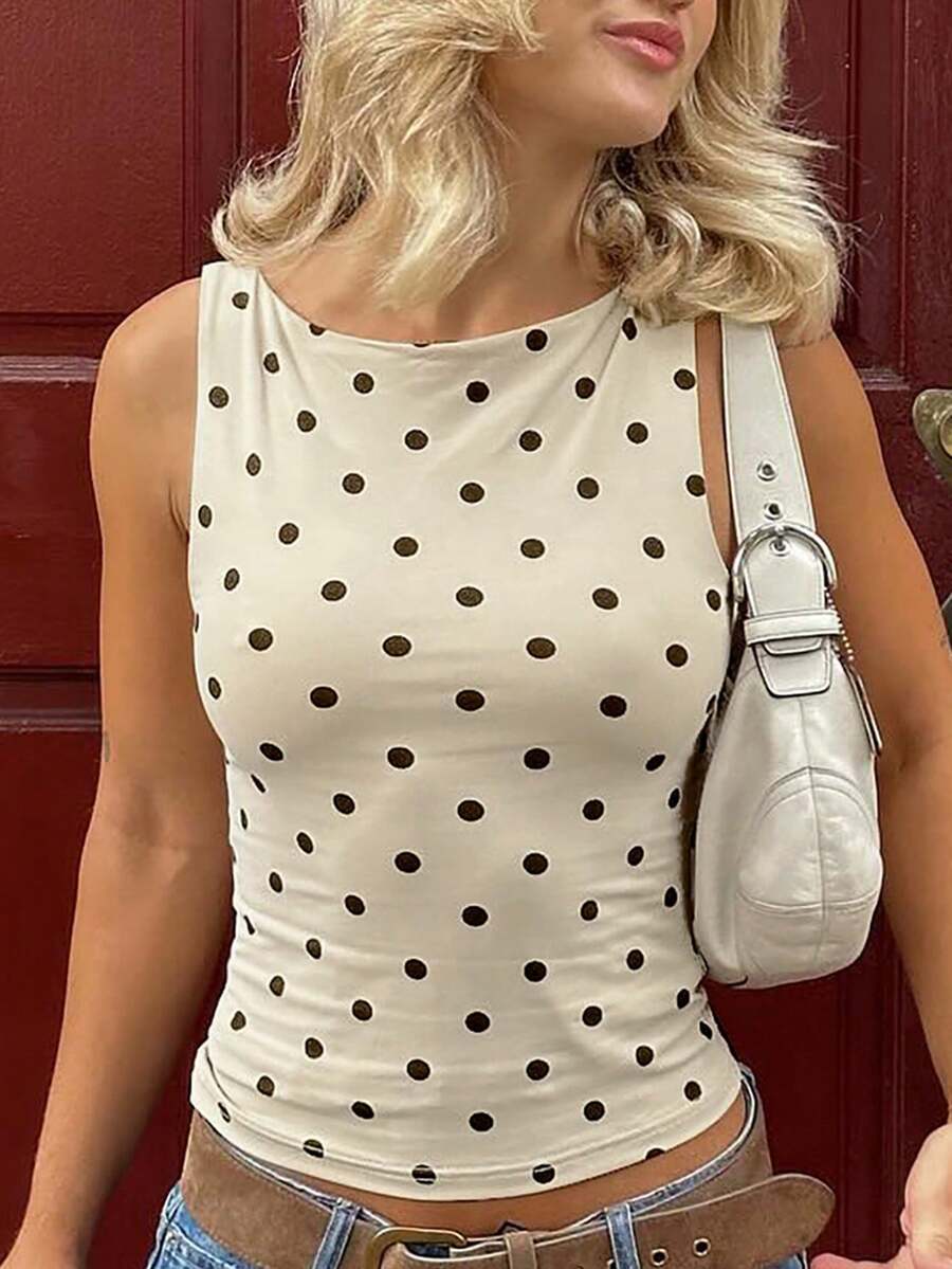 Women's polka dot sleeveless tank top with round neck, ruched rib-knit detail, regular hem, and slim fit casual style