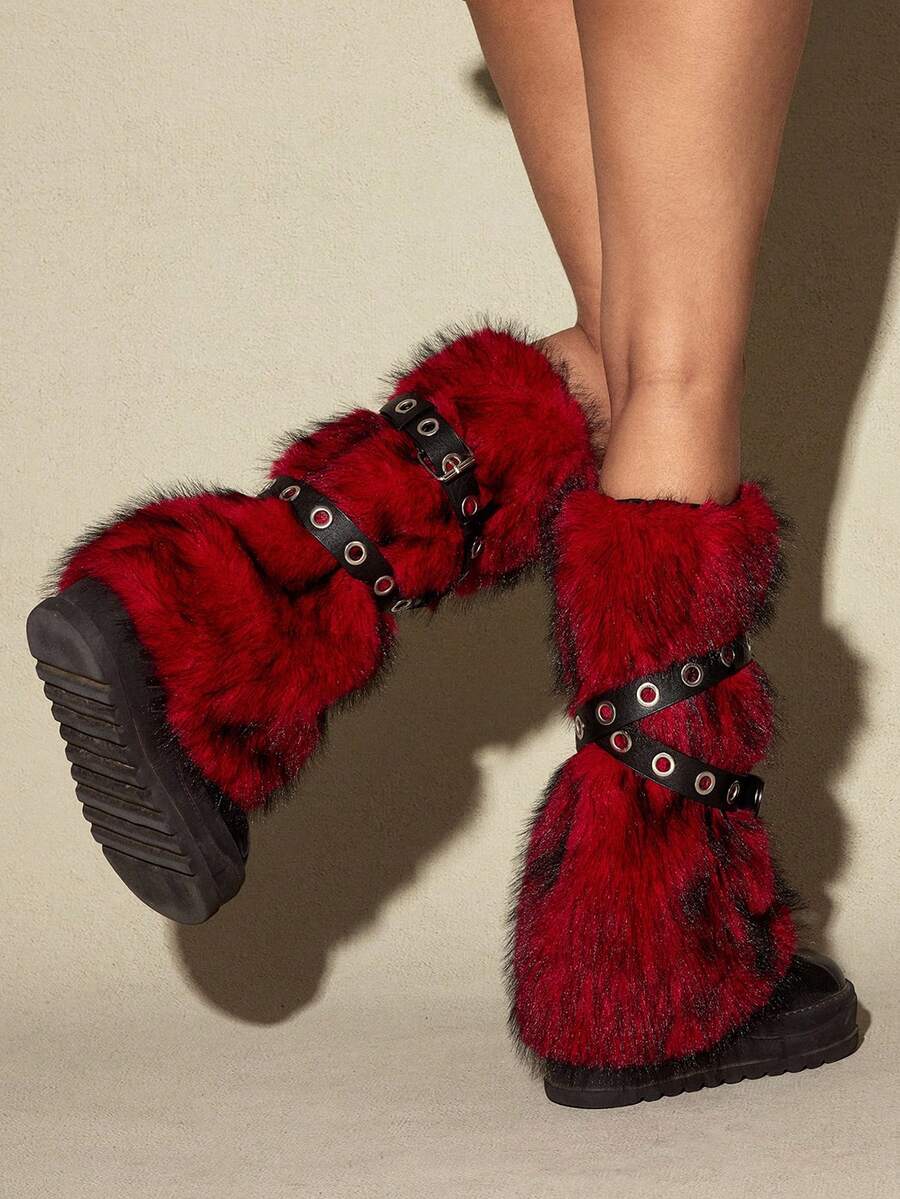 Pair of fuzzy leopard print leg warmers for women in a stylish winter goth aesthetic