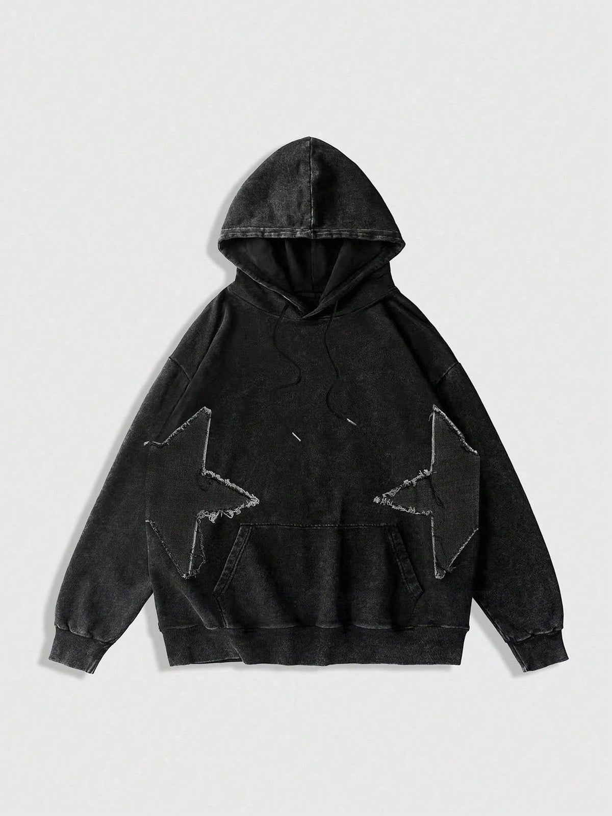 Women's plus size black hooded sweatshirt featuring a star pattern, long sleeves, drawstring hood, and front pocket in an oversized fit.